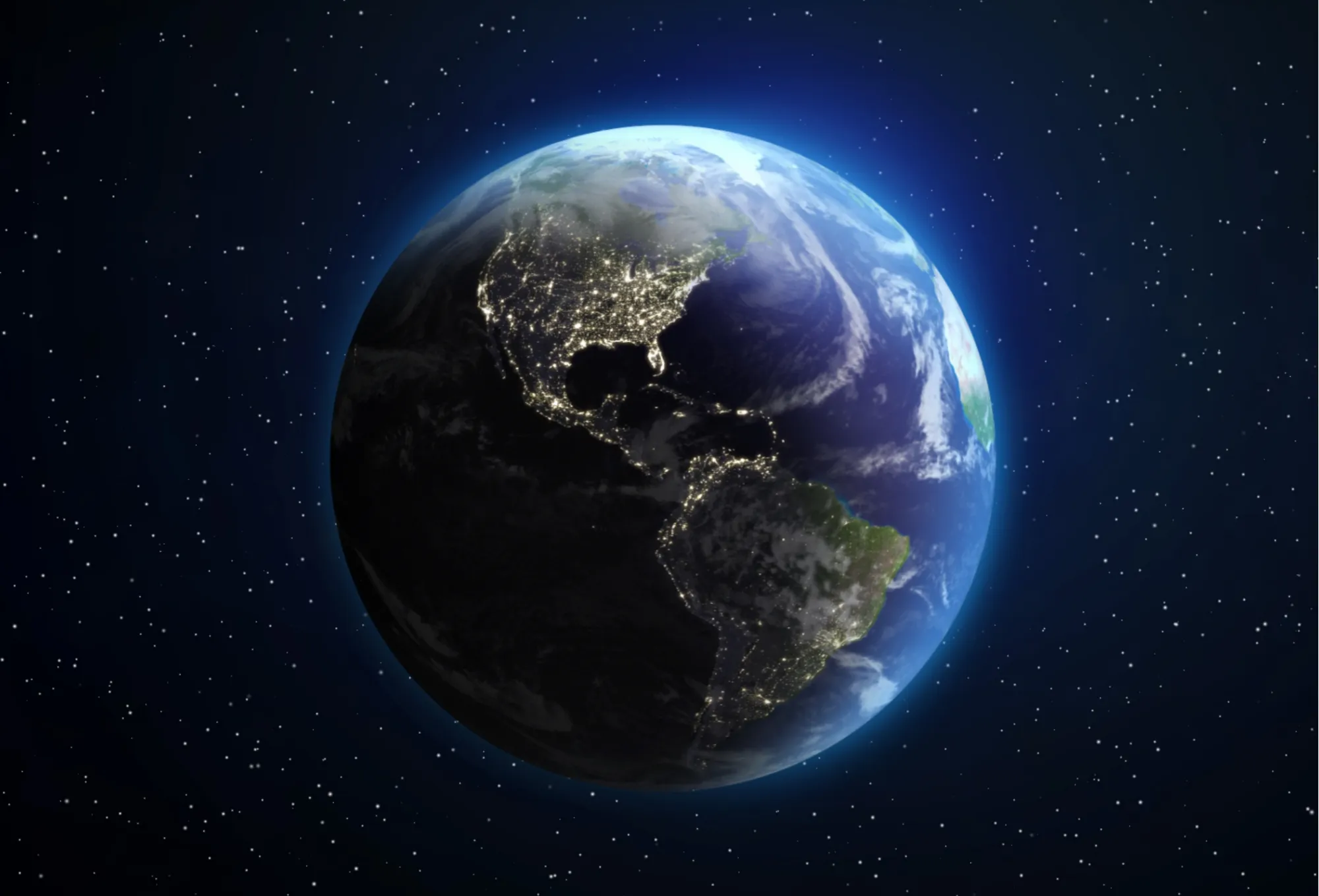 Earth seen from space, its cities lit up